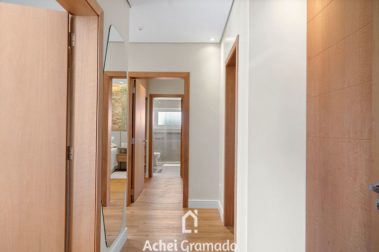 Apartamento Laje de Pedra 4 Suítes by Achei