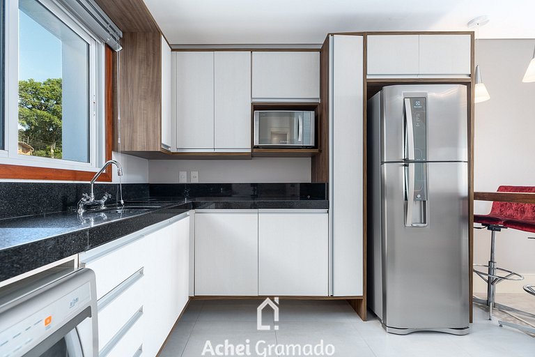 Conforto a 350m da Rua Coberta by Achei Gramado