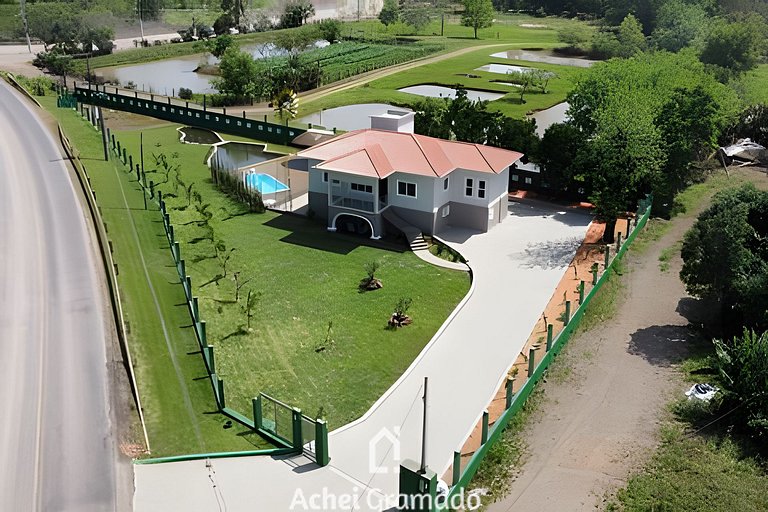 Casa Sítio Caminhos da Serra by Achei