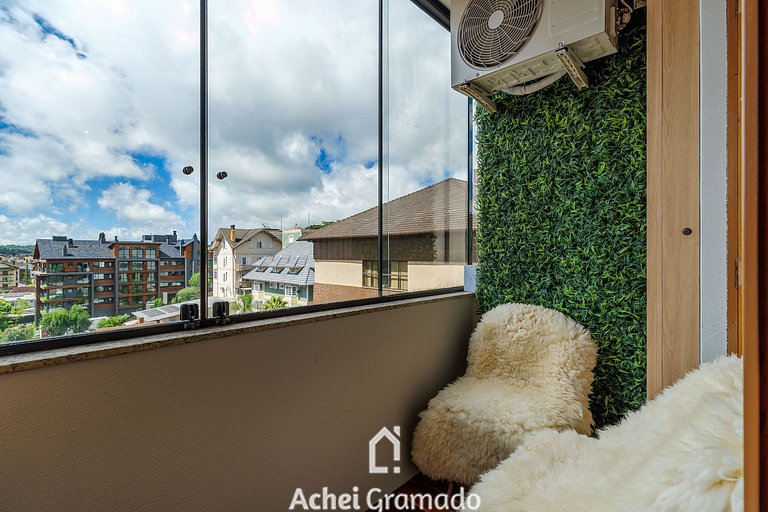 Apto no Centro e Piscina aquecida by Achei Gramado