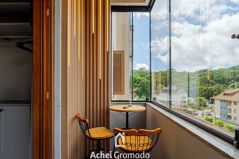 Apto no Centro e Piscina aquecida by Achei Gramado