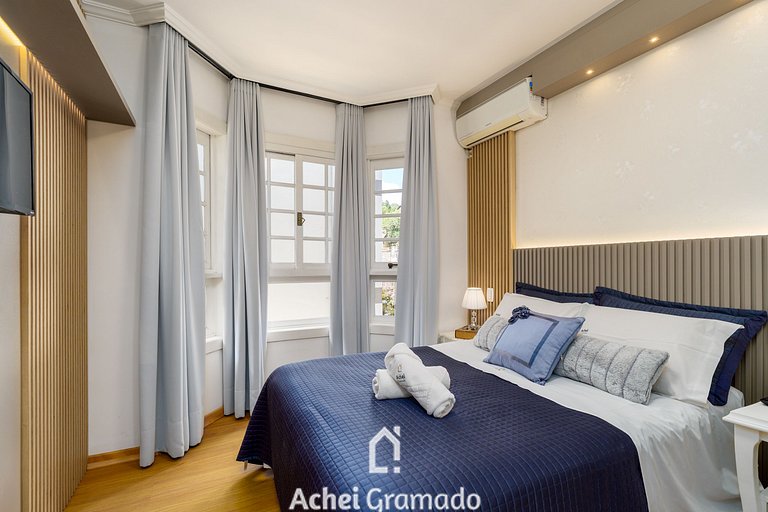 Apto bem no Centro 2 dorm by Achei Gramado