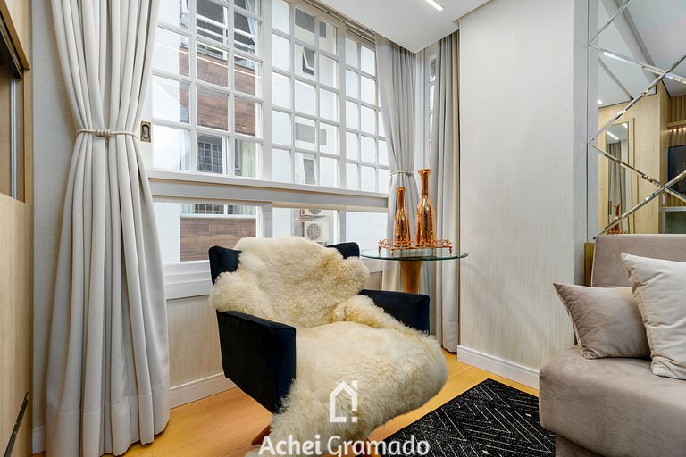 Apto bem no Centro 2 dorm by Achei Gramado