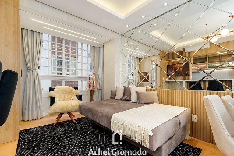 Apto bem no Centro 2 dorm by Achei Gramado