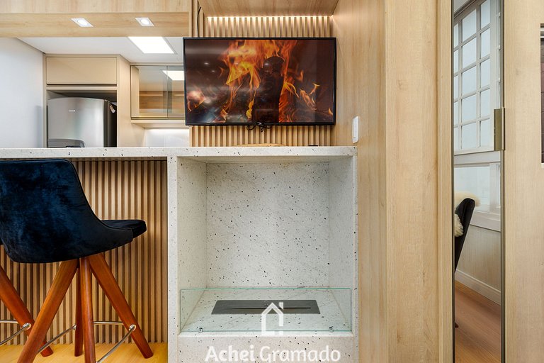 Apto bem no Centro 2 dorm by Achei Gramado