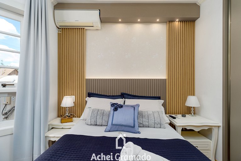 Apto bem no Centro 2 dorm by Achei Gramado