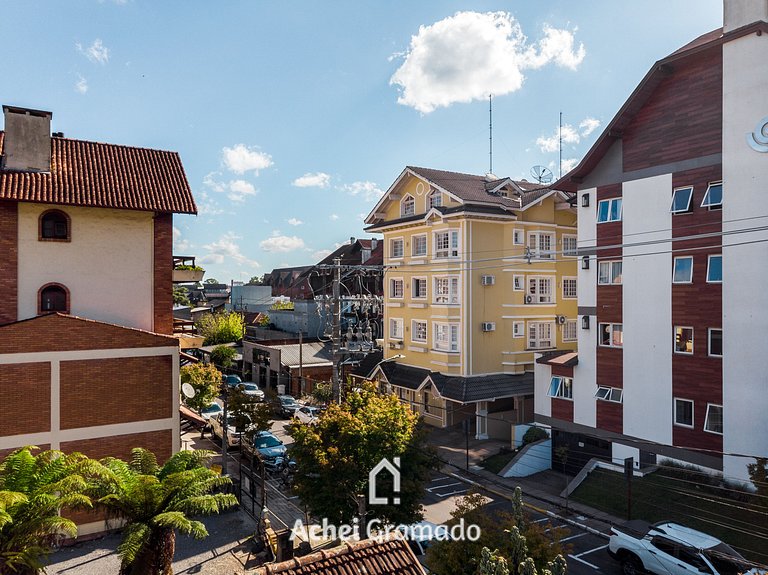 Apto bem no Centro 2 dorm by Achei Gramado
