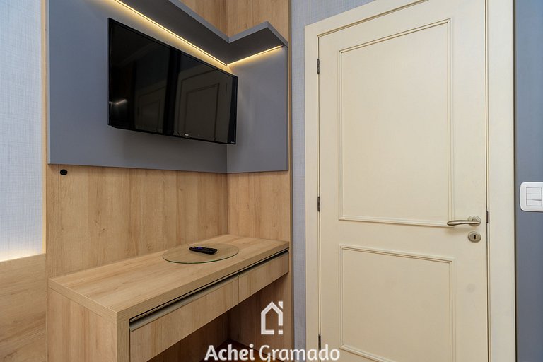 Apto bem no Centro 2 dorm by Achei Gramado