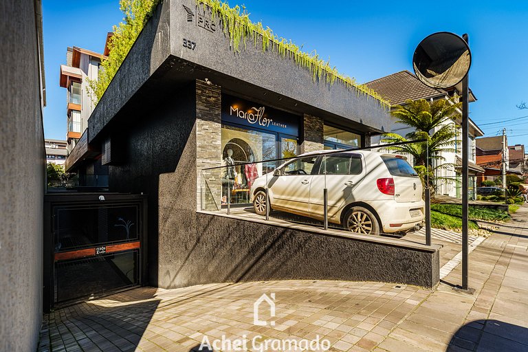 Astro 1 dorm 400m da Rua Coberta by Achei Gramado