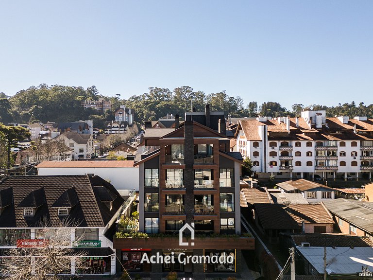 Astro 1 dorm 400m da Rua Coberta by Achei Gramado